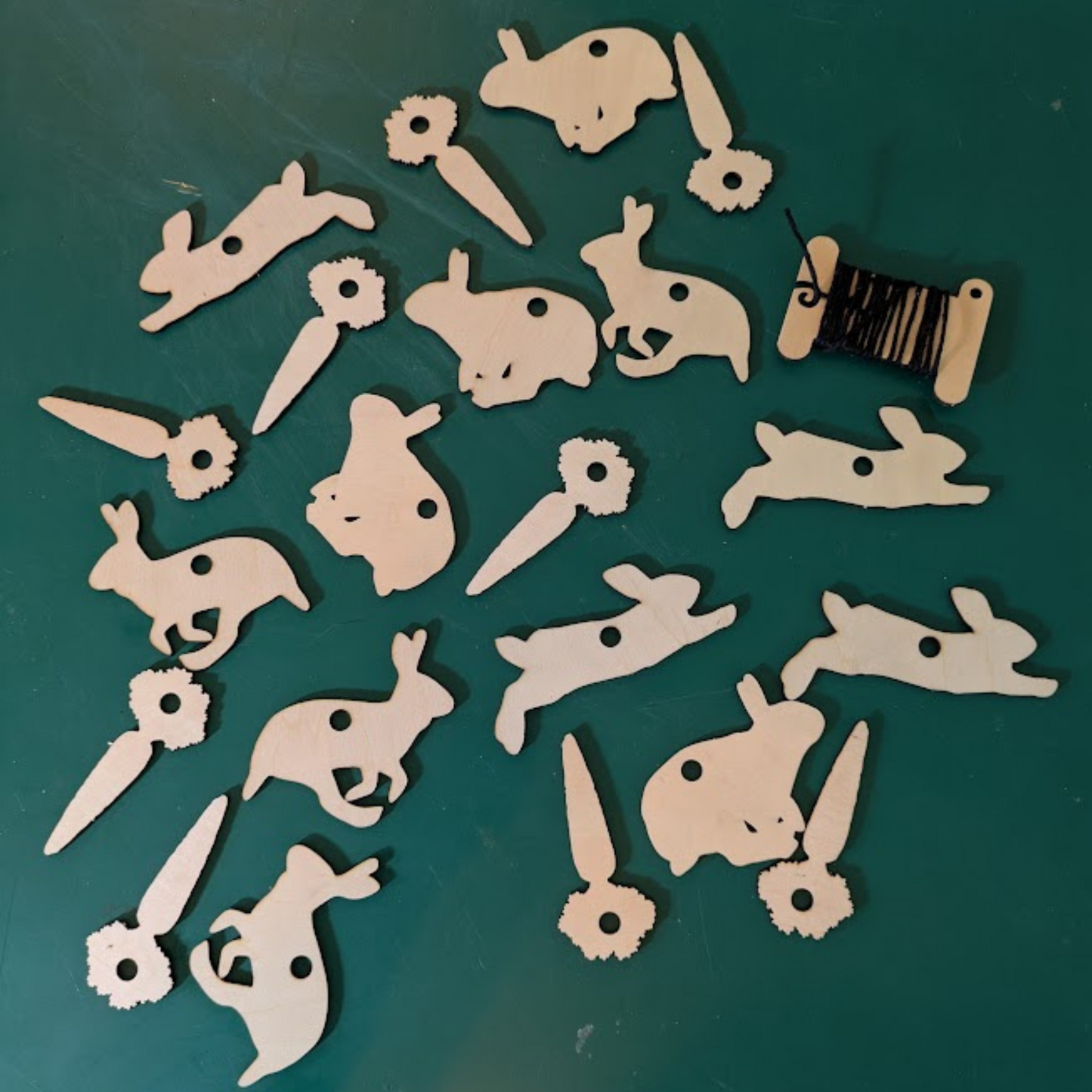 DIY wooden Easter decor kit, with rabbit and carrot cut outs.