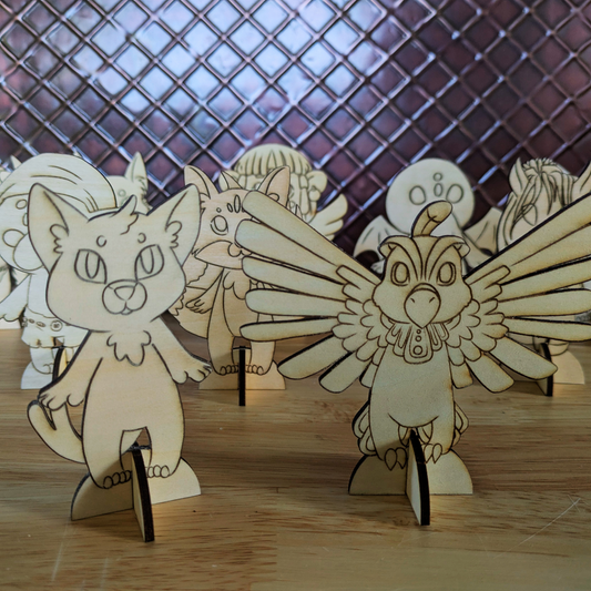 Some of the wooden mythos chibi figures.
