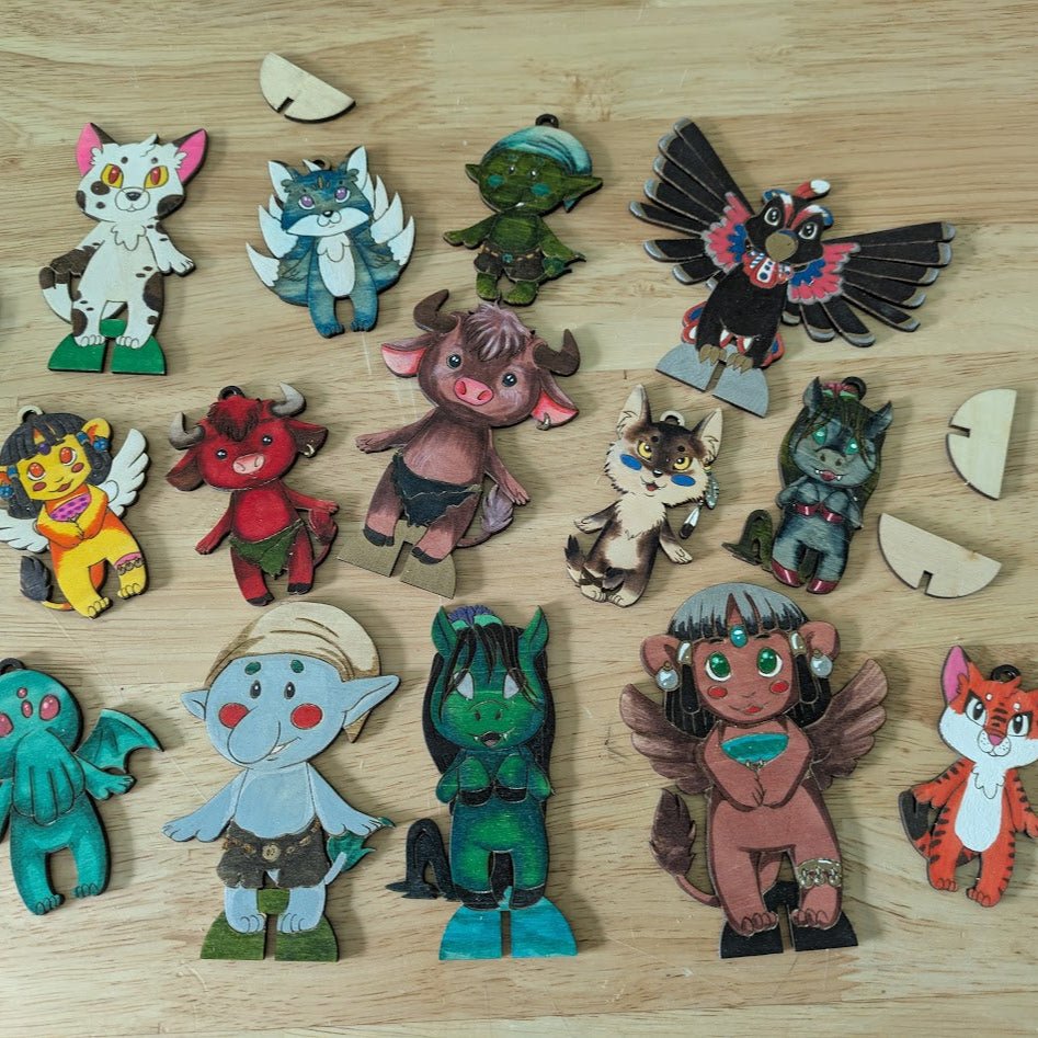 Colored mythos chibis, standing and ornament examples. Includes: Nekomata, Kitsune, Thunderbird, Sphinx, Minotaur, Coyote, Kelpie, Cthulhu and Troll. DIY Myths, Legends and Monster Chibi Set: Coyote, Cthulhu, Da - jo - ji, Kelpie, Kitsune, Minotaur, Nekomata, Spinx, Thunderbird and Troll Art & Craft Kits Raven King Crafts