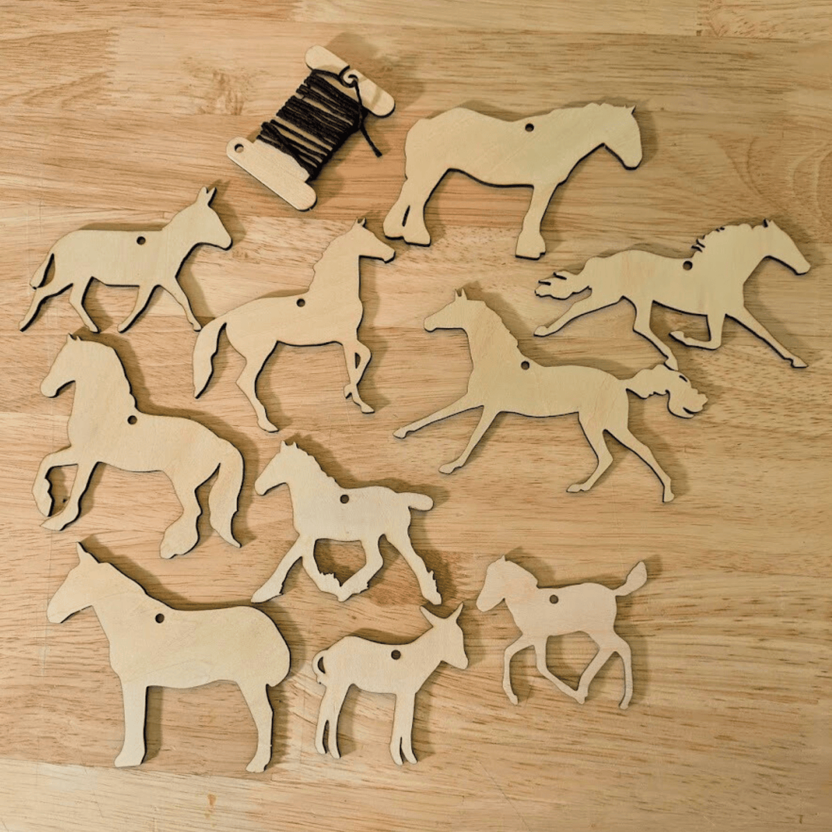 Set 2 of the horse ornament shape options. It has 10 different cutouts of horses donkeys and a mule. Each ornament is wood and sanded to paint or color. DIY Wooden Horse Ornament Kit - 10 Unique Horse Shapes per Set - 20 total! Art & Crafting Materials Raven King Crafts