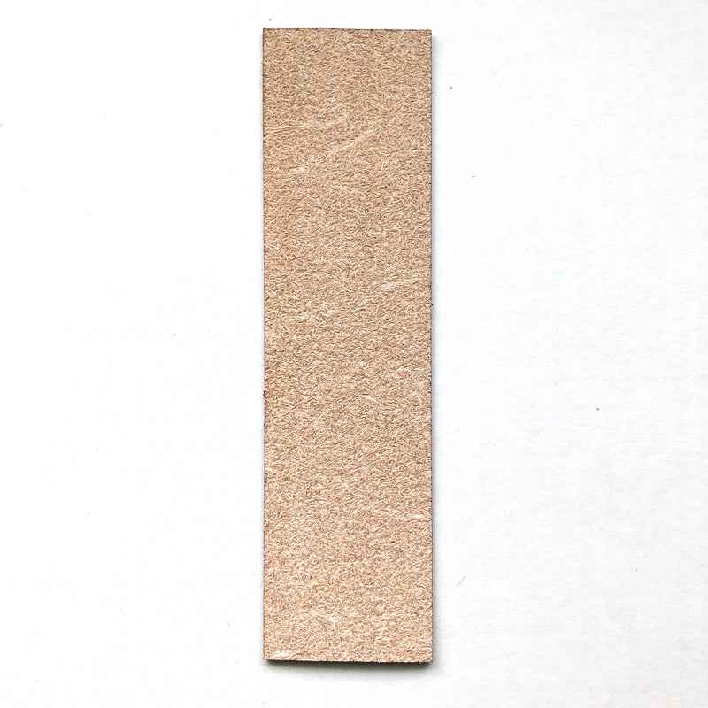 The back of the leather bookmark is unfinished.
