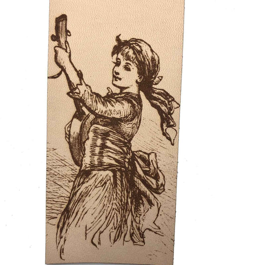 A leather bookmark engraved with the antique art of a girl playing music.