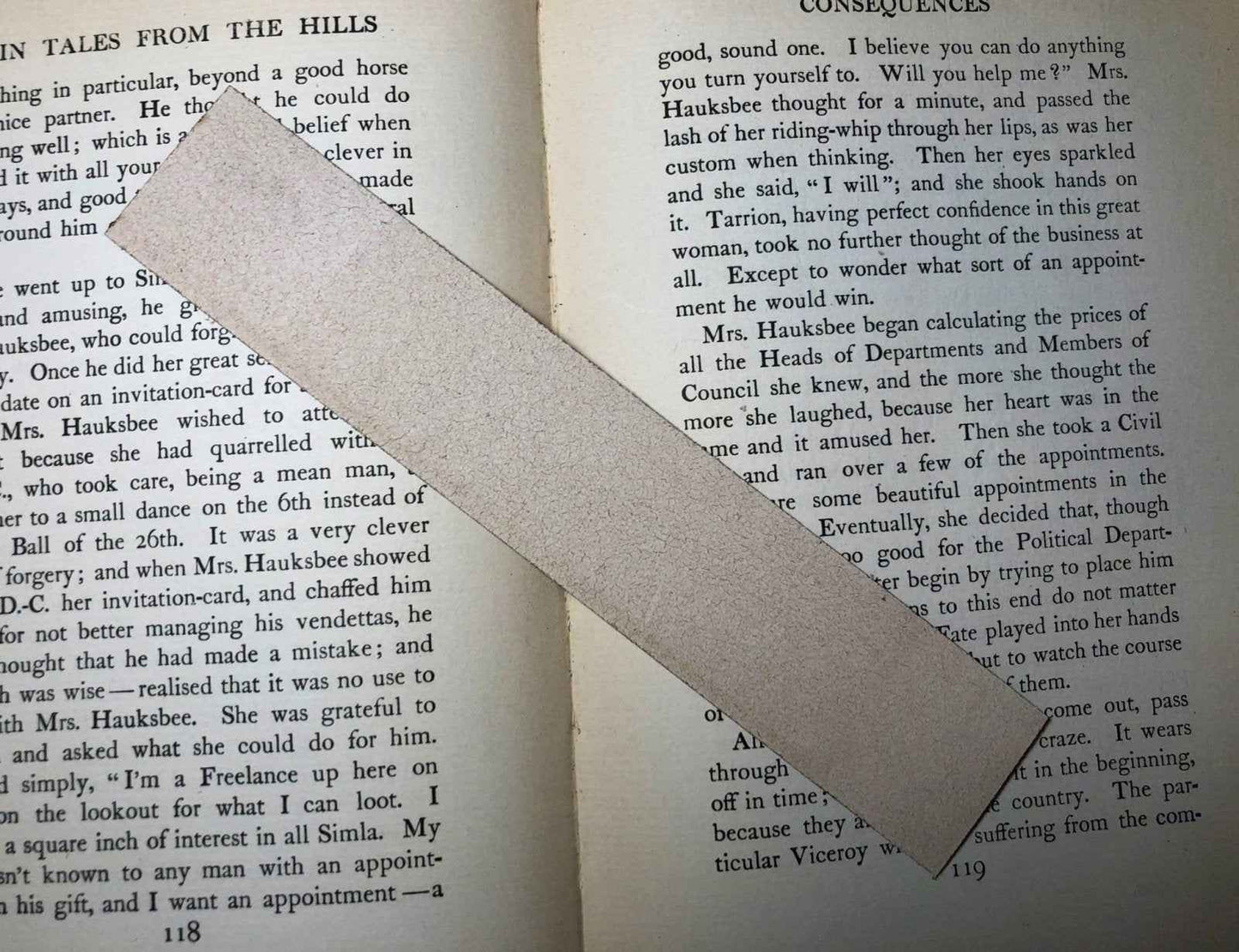 The backs of the leather bookmarks are unfinished and you can see the leather grain.