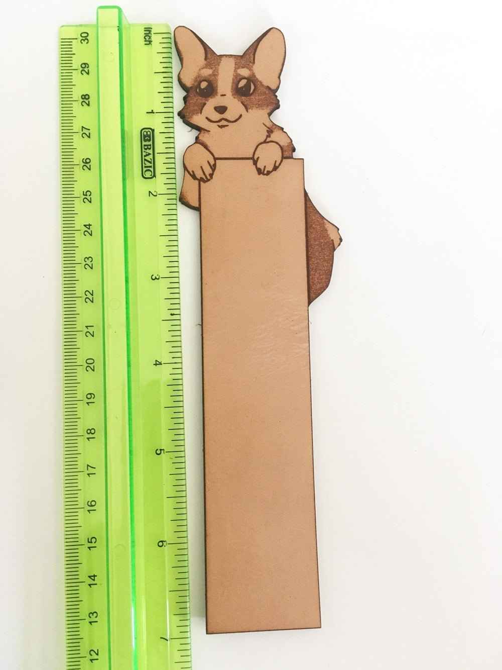 Pembroke Welsh Corgi Bookmark next to a ruler for scale.