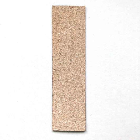 The backs of the leather bookmarks are unfinished and you can see the leather grain.