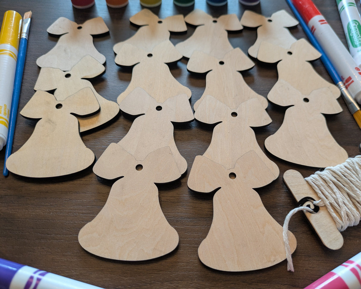 A photograph of our wooden Christmas bells from above.
