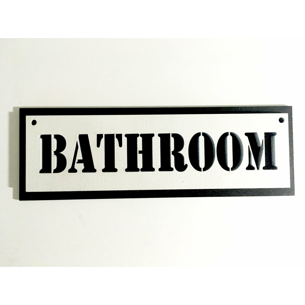 A black and white plywood sign that says bathroom. Wooden Bathroom Sign Signage Raven King Crafts