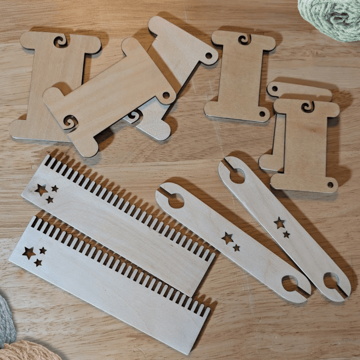 A photograph of some of the wooden weaving supplies we make. Wooden Bobbins / Spools - 3 Packs Art & Crafting Materials Raven King Crafts