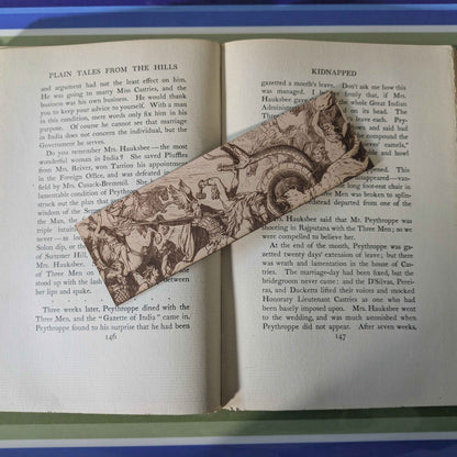 A leather bookmark featuring the battle of ragnarok with Thor, Odin, Fenris and more.
