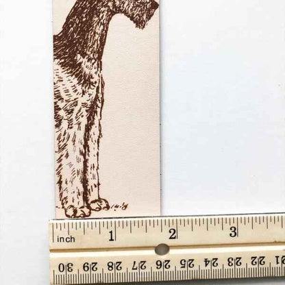 Airedale Terrier Bookmark next to a ruler for scale. Airedale Terrier Leather Bookmark - Dog Collection Bookmarks Raven King Crafts