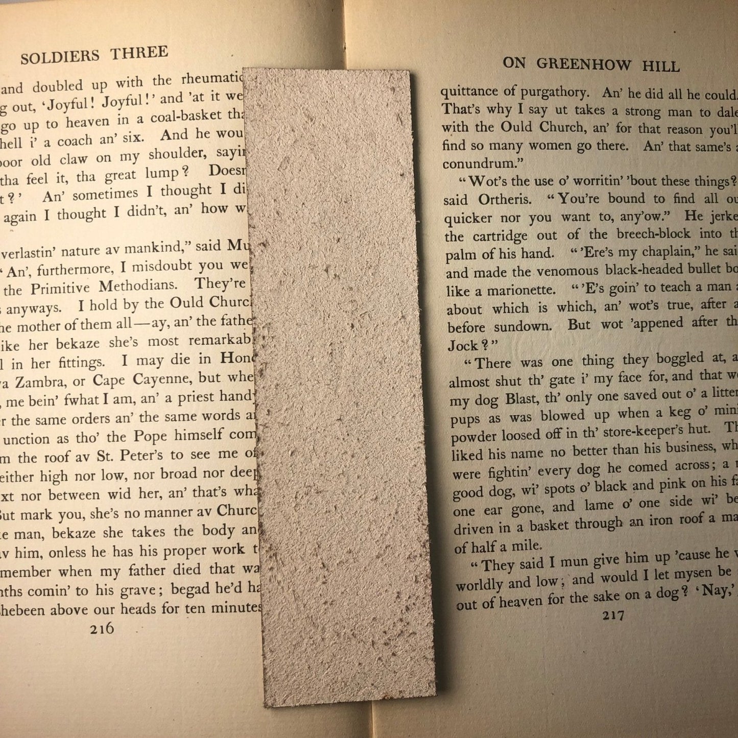 A photograph of the back of the bookmark showing that the back is blank and has more texture than the front of the bookmark.