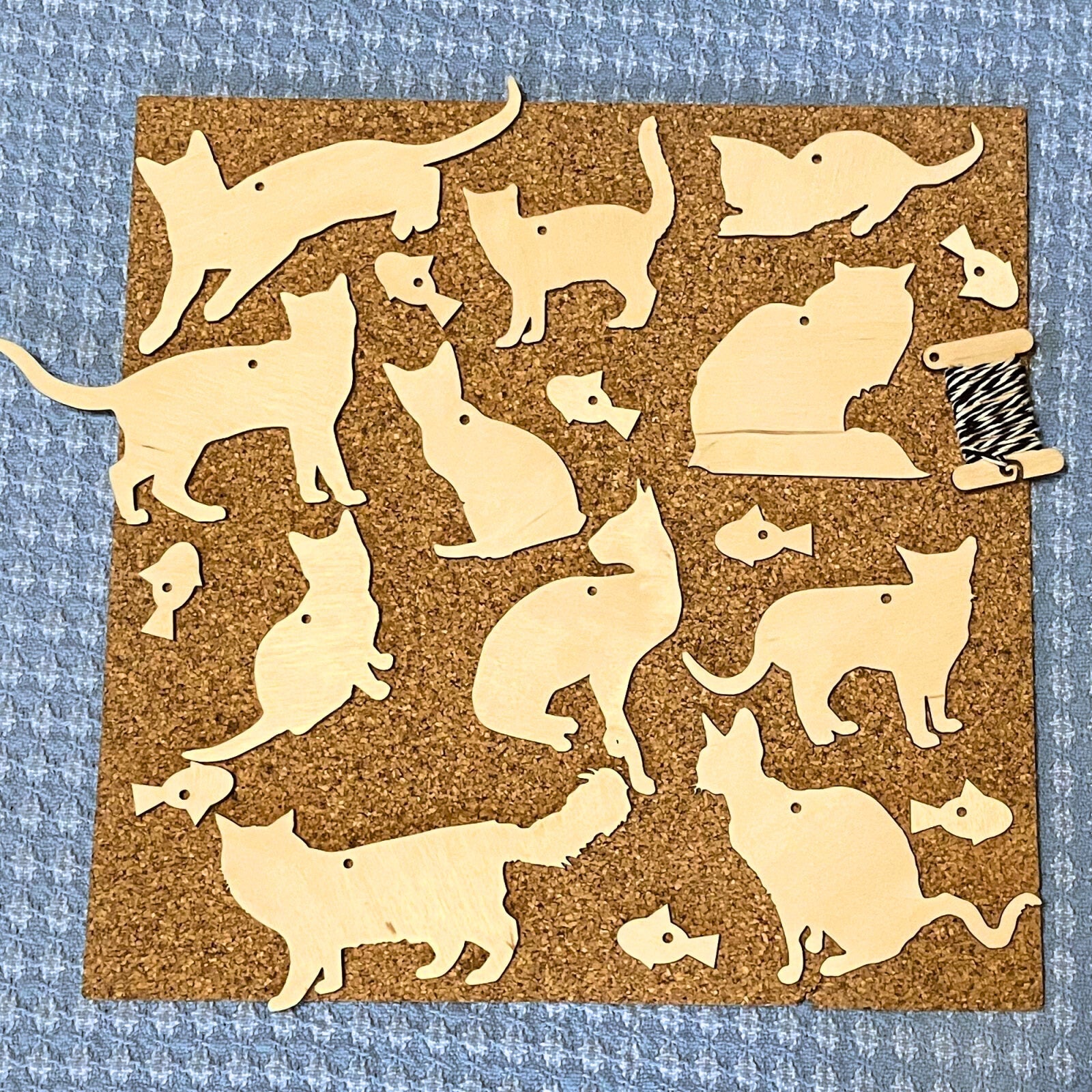 Write a brief description of the file for people with visual impairment or low - bandwidth connections. Cat Cutouts - DIY Ornaments Art & Craft Kits Raven King Crafts
