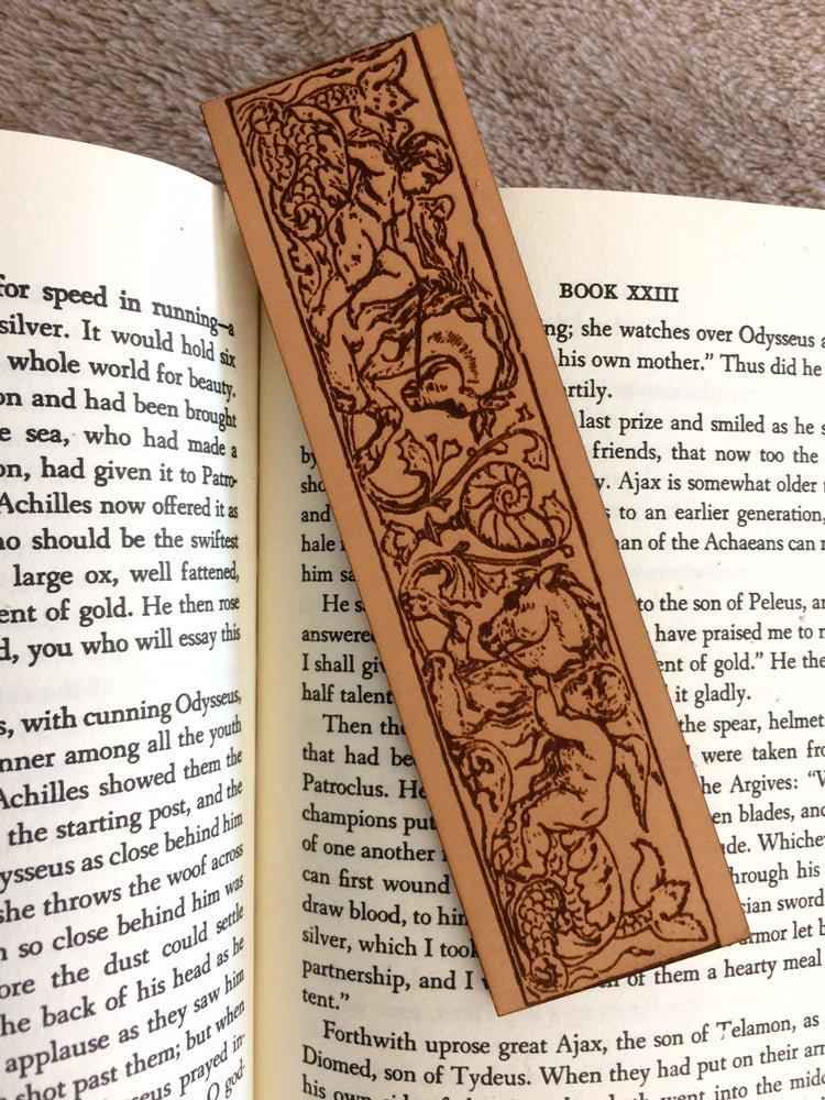 Cherubs Riding Hippocampus Bookmark - Leather Cherubs Riding Hippocampus Bookmark - Leather Bookmarks Raven King Crafts