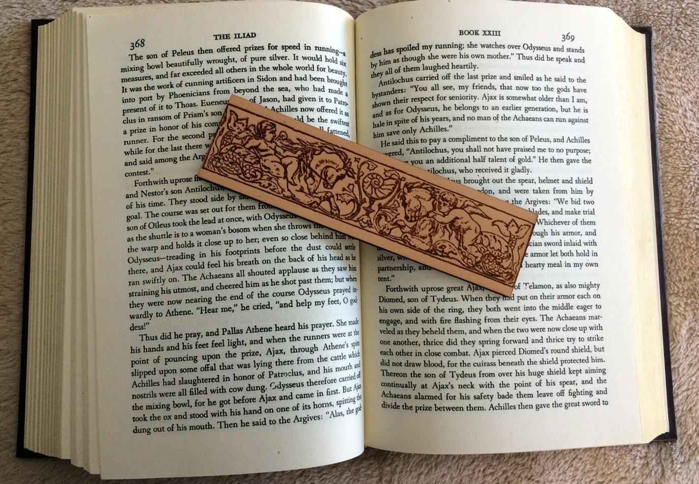 Cherubs Riding Hippocampus Bookmark - Leather Cherubs Riding Hippocampus Bookmark - Leather Bookmarks Raven King Crafts