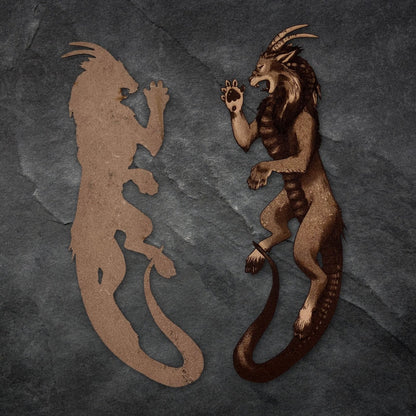 The left of the image shows the back of the bookmark as being unengraved with the natural grain of the leather visible. The right one is the engraved bookmark. Chimera Bookmark - Leather Bookmarks Raven King Crafts