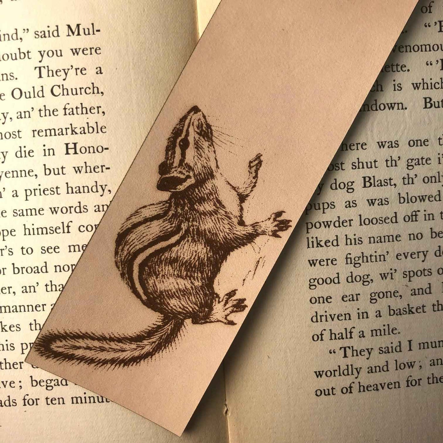A leather bookmark engraved with the antique art of a chipmunk on it. Chipmunk Bookmark Bookmarks Raven King Crafts