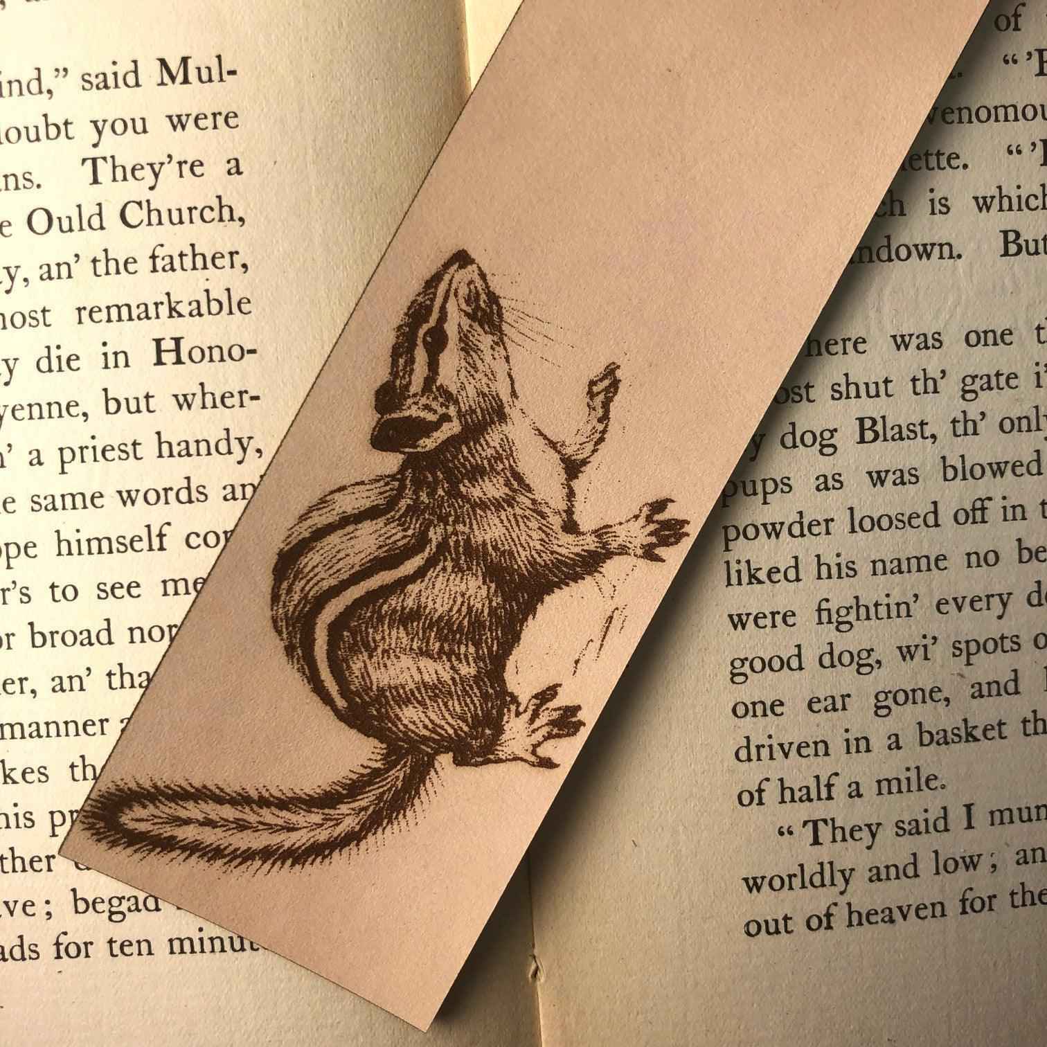 A leather bookmark engraved with the antique art of a chipmunk on it. Chipmunk Bookmark Bookmarks Raven King Crafts