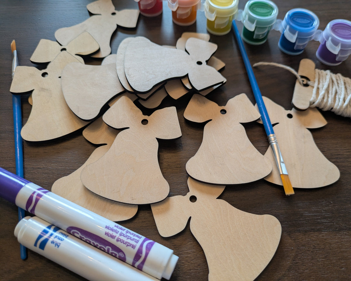 A photograph of our wooden Christmas bell ornament blanks from above.