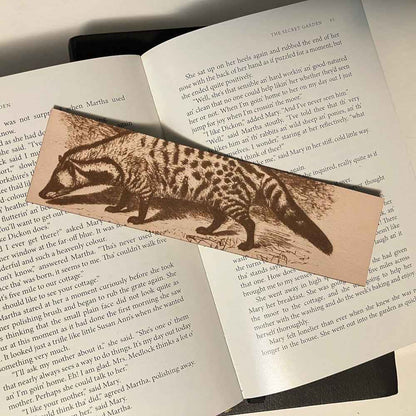 A leather bookmark engraved with the antique art of a civet on it. Civet Bookmark - Leather Bookmarks Raven King Crafts