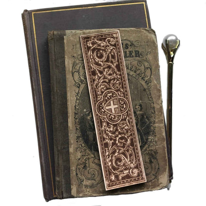 A leather bookmark engraved with the antique art of a cross and shield. Cross and Shield Leather Bookmark Bookmarks Raven King Crafts