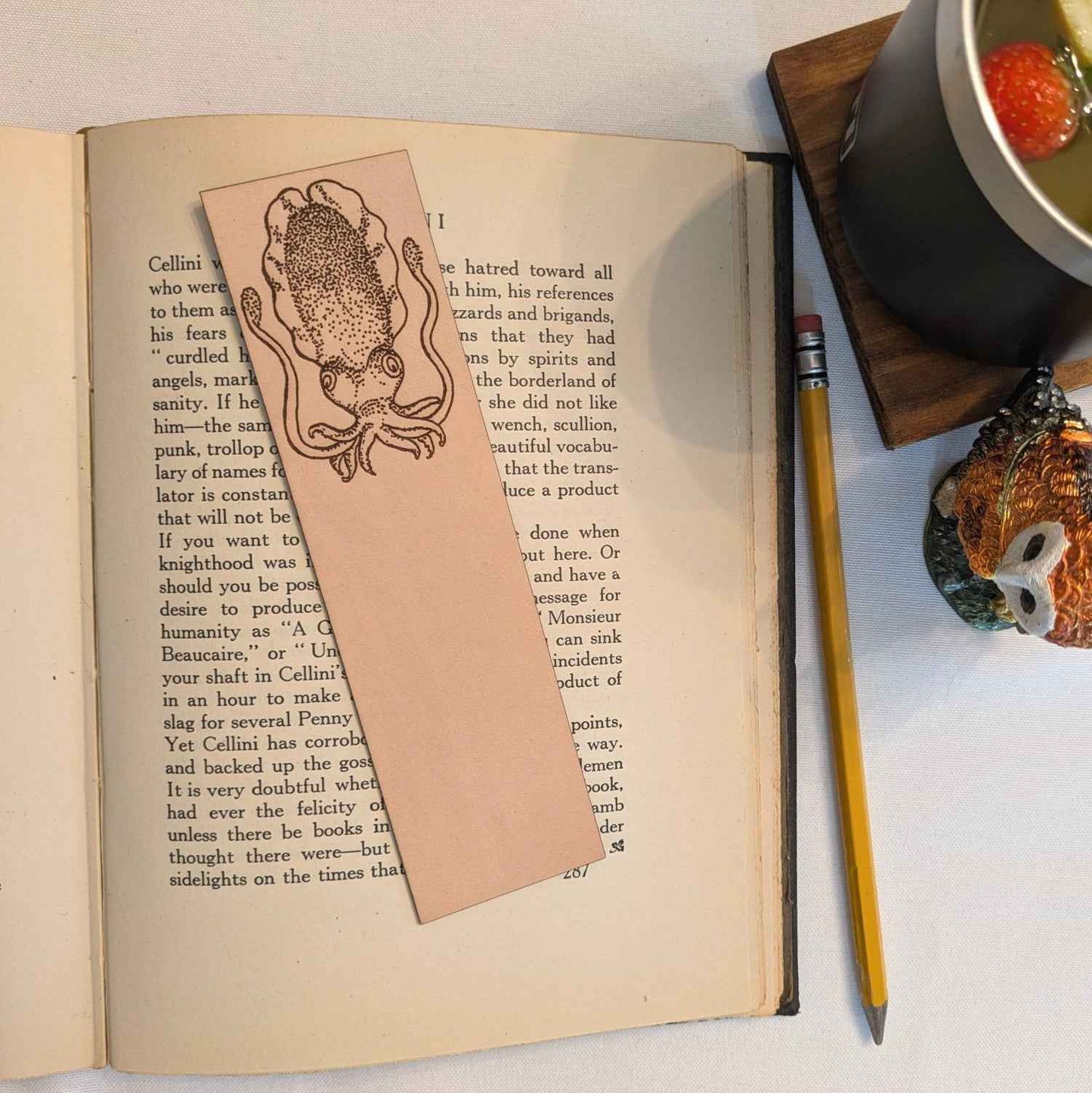 A leather bookmark engraved with the antique art of a cuttlefish. Cuttlefish Bookmark Bookmarks Raven King Crafts