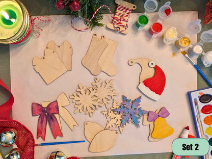 A photograph of our wooden Christmas ornament kit, with some of the Christmas shaped ornaments decorated as examples. DIY Wooden Christmas Ornament Kits for Creative Holiday Crafting Art & Crafting Materials Raven King Crafts
