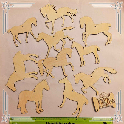 Set 1 of the blank horse ornament kits next to a ruler to help show scale. DIY Wooden Horse Ornament Kit - 10 Unique Horse Shapes per Set - 20 total! Art & Crafting Materials Raven King Crafts