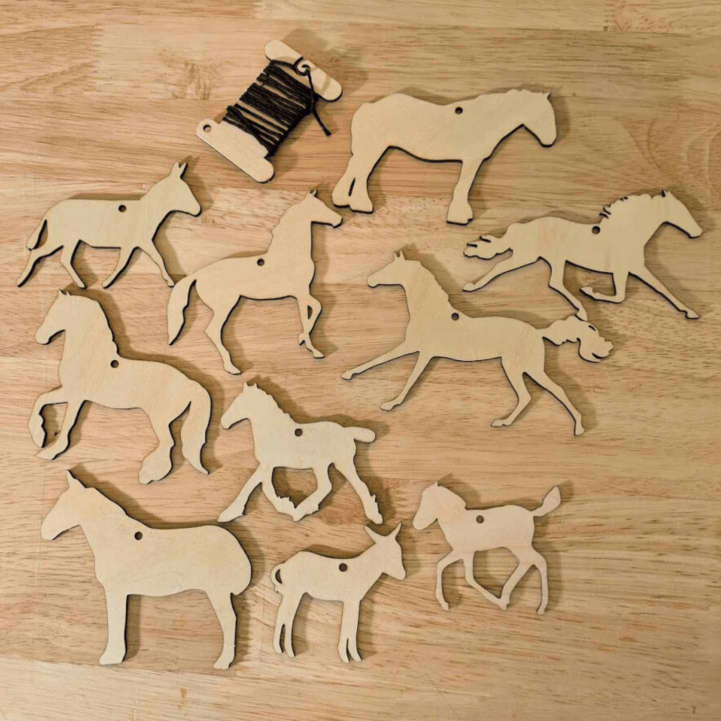 Set 2 of the horse ornament shape options. It has 10 different cutouts of horses donkeys and a mule. Each ornament is wood and sanded to paint or color. DIY Wooden Horse Ornament Kit - 10 Unique Horse Shapes per Set - 20 total! Art & Crafting Materials Raven King Crafts