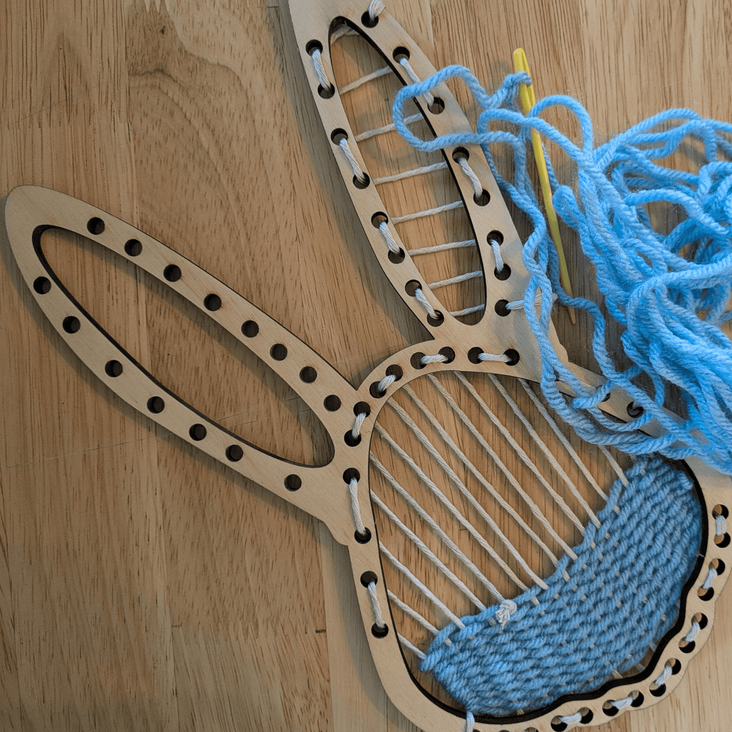 An example of the bunny loom with a weaving started. Easter Bunny and Egg Loom Kit Art & Craft Kits Raven King Crafts
