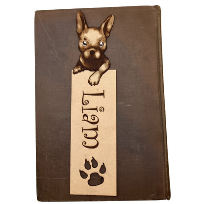 The French Bulldog leather bookmark. The bookmark shows the personalized option with painted white highlights.