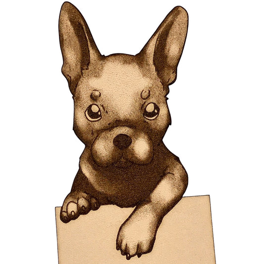 A closeup of the French Bulldog leather bookmark.