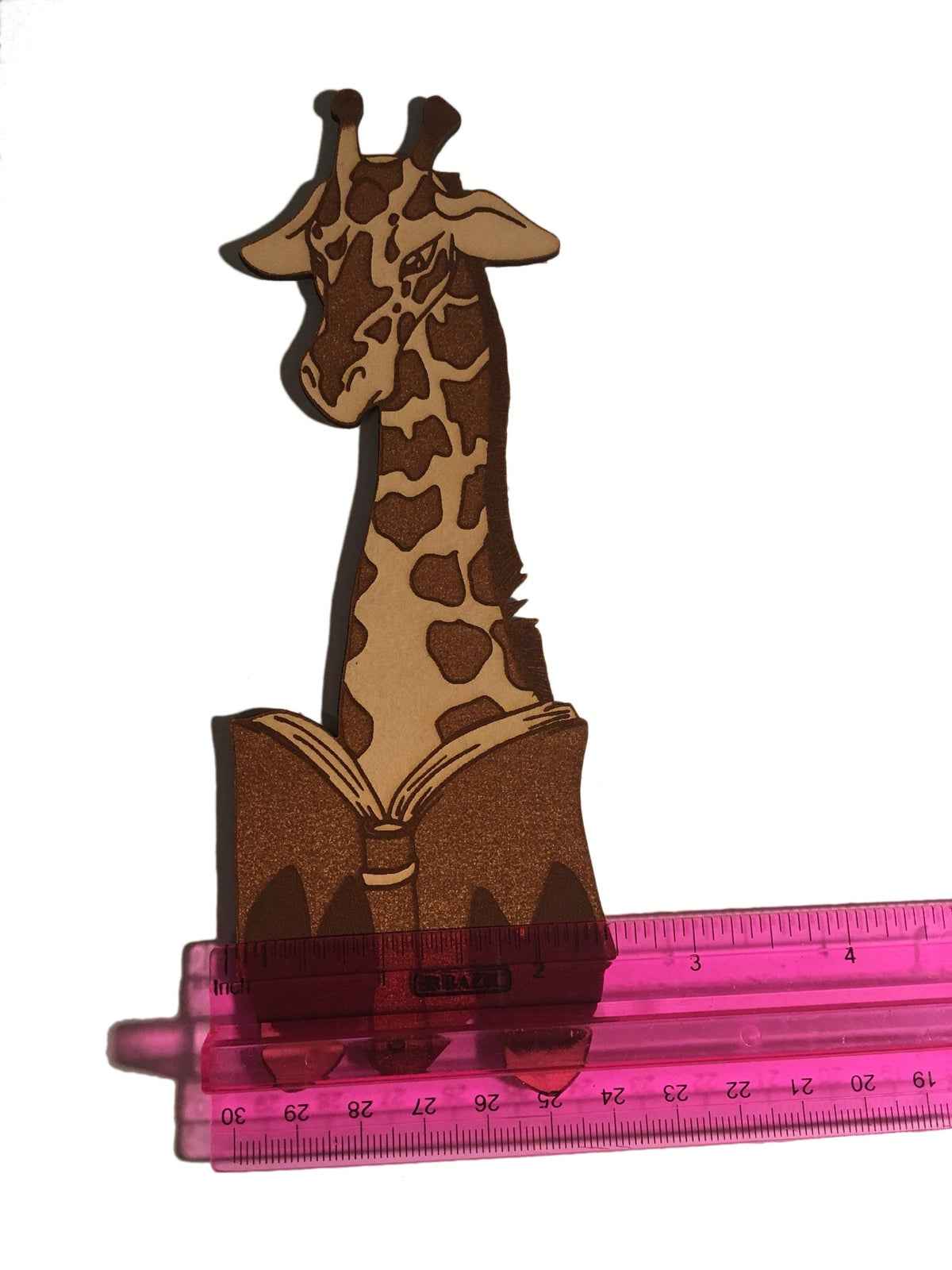 A leather bookmark shaped like a giraffee reading a book. Great Book lover gift. Giraffe Reading Leather Bookmark - Quirky Book-Lover Gift Bookmarks Raven King Crafts