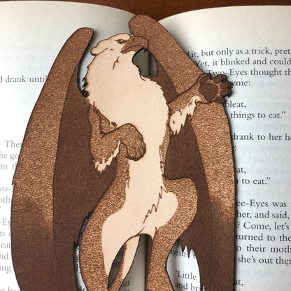 A leather bookmark of a griffin, the mythical beast. Griffin Bookmark - Leather | Wonderful Fantasy Beast Gift Bookmarks Raven King Crafts
