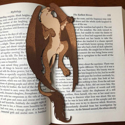 A leather bookmark shaped like a griffon. Griffin Bookmark - Leather | Wonderful Fantasy Beast Gift Bookmarks Raven King Crafts