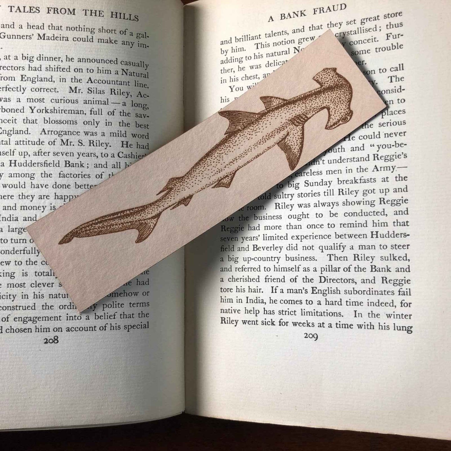 A leather bookmark engraved with the art of a hammerhead shark. Hammerhead Shark Bookmark Bookmarks Raven King Crafts