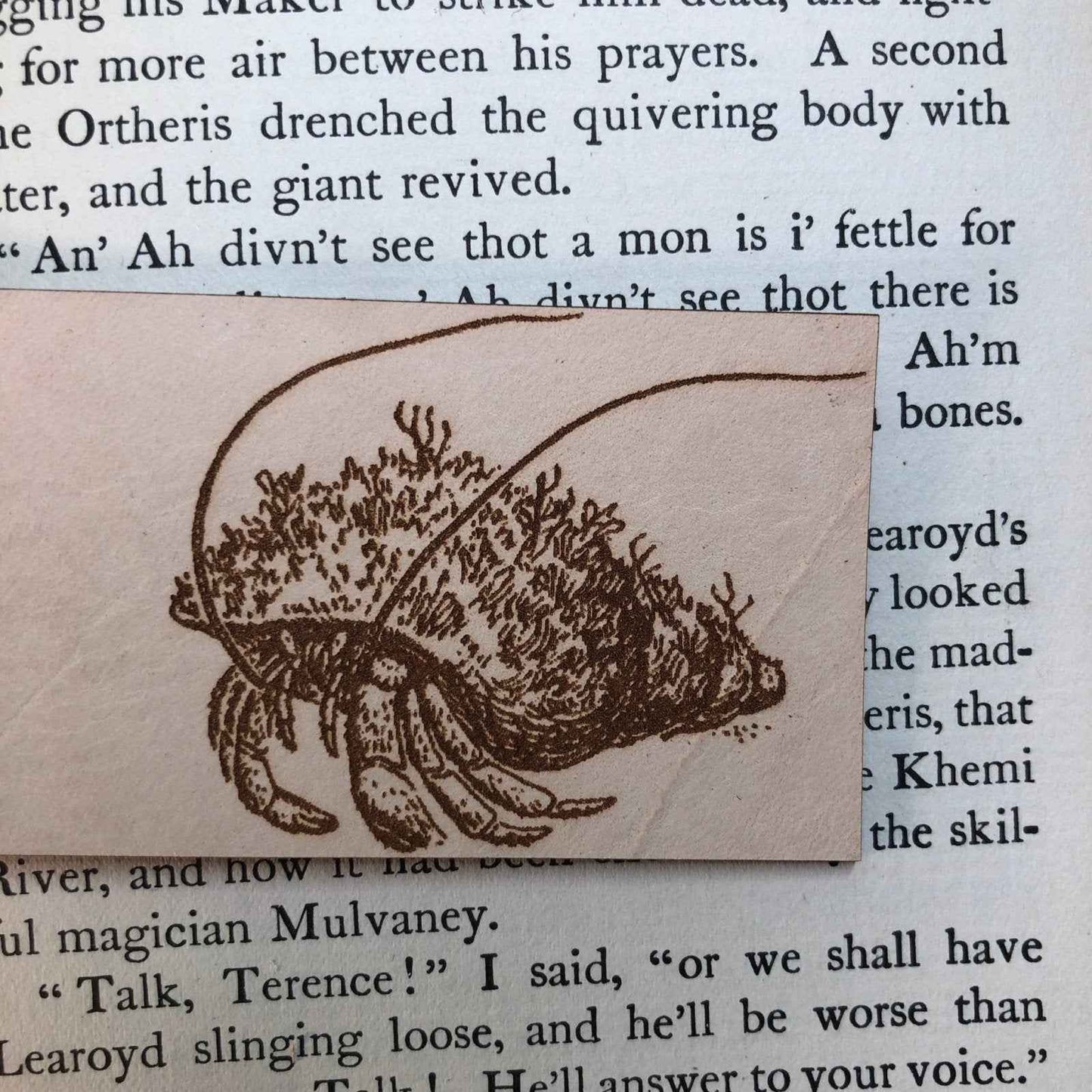A leather bookmark engraved with the antique art of hermit crabs. Hermit Crabs Bookmark Bookmarks Raven King Crafts