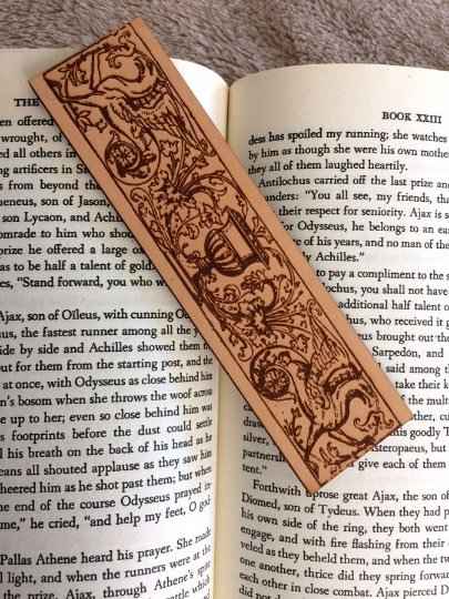 A leather bookmark engraved with the antique art of a hippogriff, the mythical beast. Historical Hippogriff Leather Bookmark Bookmarks Raven King Crafts