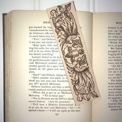 A leather bookmark engraved with the antique art of the sphinx mythical beasts. Historical Sphinx Leather Bookmarks Bookmarks Raven King Crafts