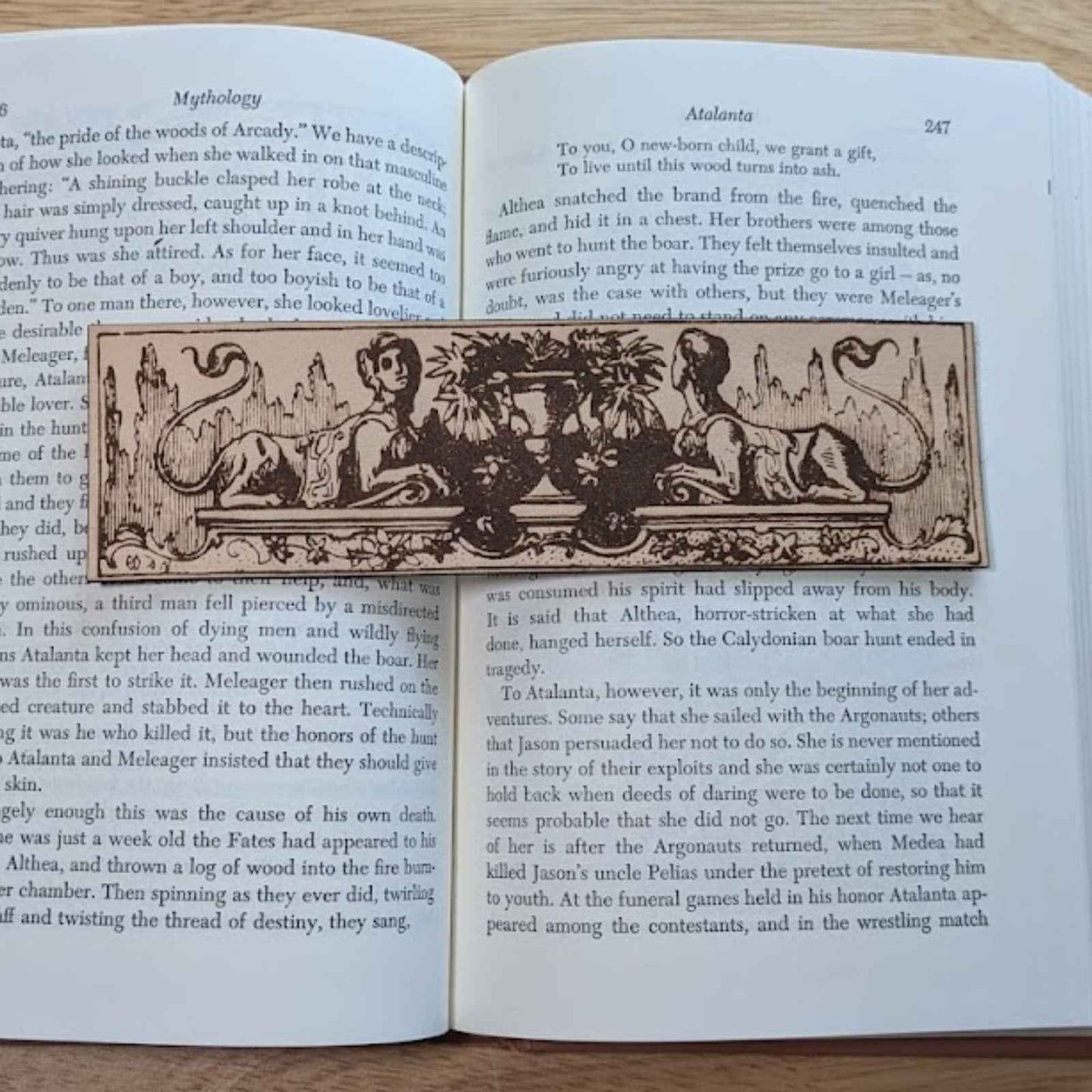 A leather bookmark engraved with the antique art of the sphinx mythical beasts. Historical Sphinx Leather Bookmarks Bookmarks Raven King Crafts