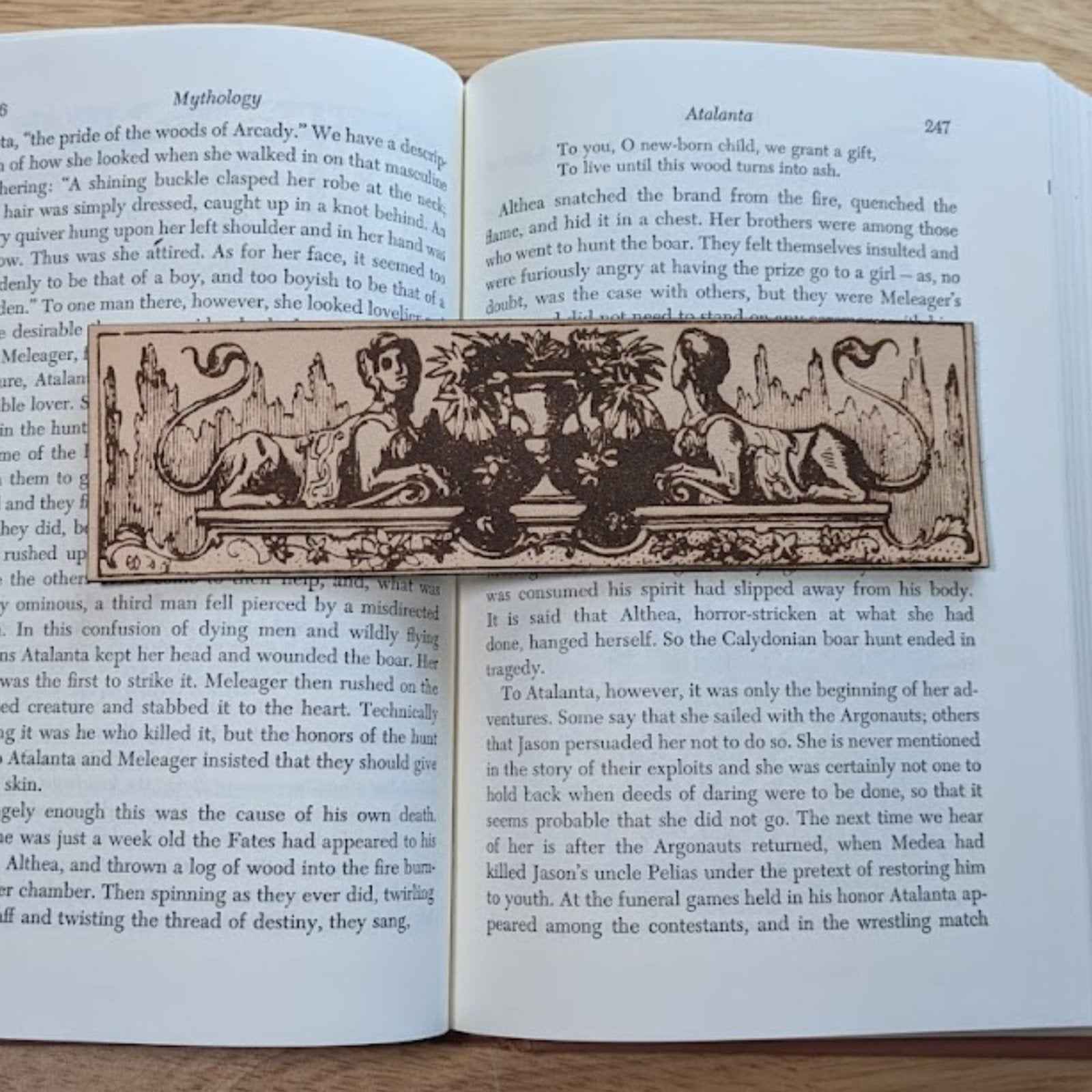 A leather bookmark engraved with the antique art of the sphinx mythical beasts. Historical Sphinx Leather Bookmarks Bookmarks Raven King Crafts