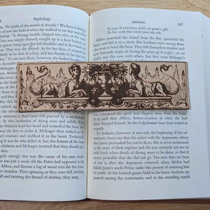A leather bookmark engraved with the antique art of the sphinx mythical beasts. Historical Sphinx Leather Bookmarks Bookmarks Raven King Crafts