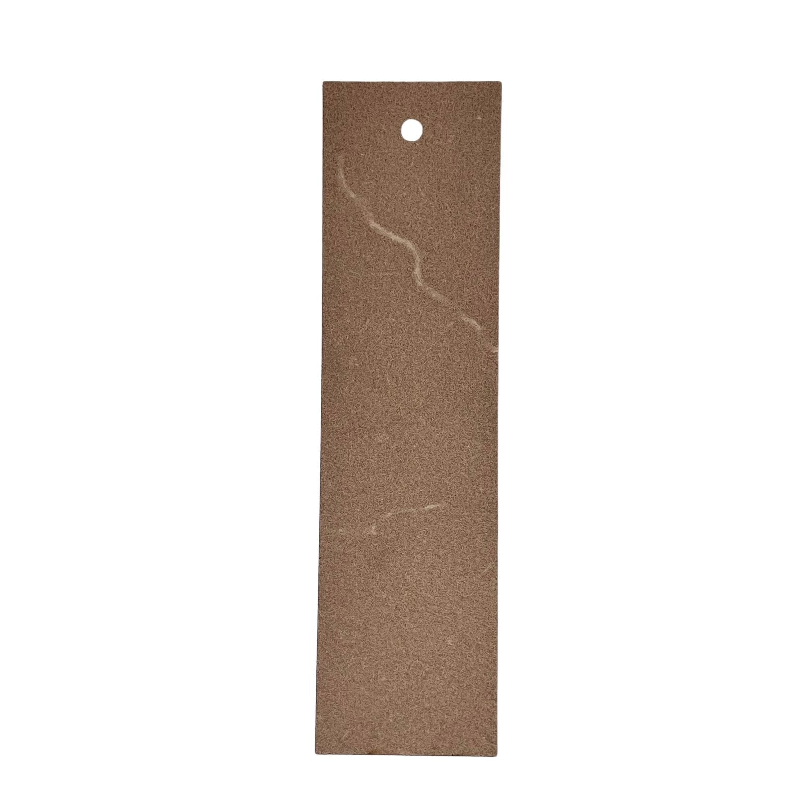 The back of the bookmark is unfinished. Juvenile Barred Owl Bookmark - Leather Bookmarks Raven King Crafts