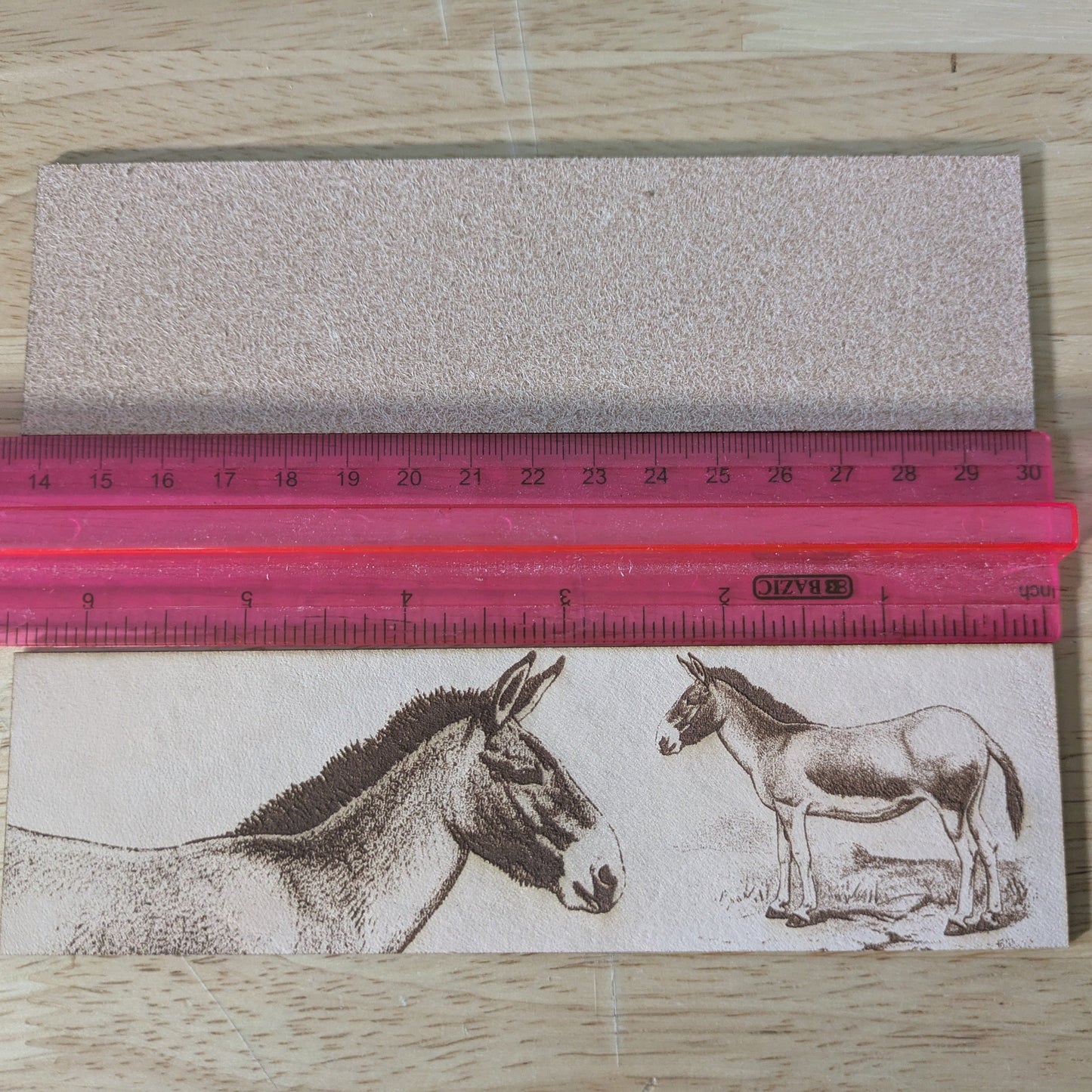 Tibetan wild donkey bookmark next to a ruler. Kiang of Tibet - Leather Bookmark Bookmarks Raven King Crafts