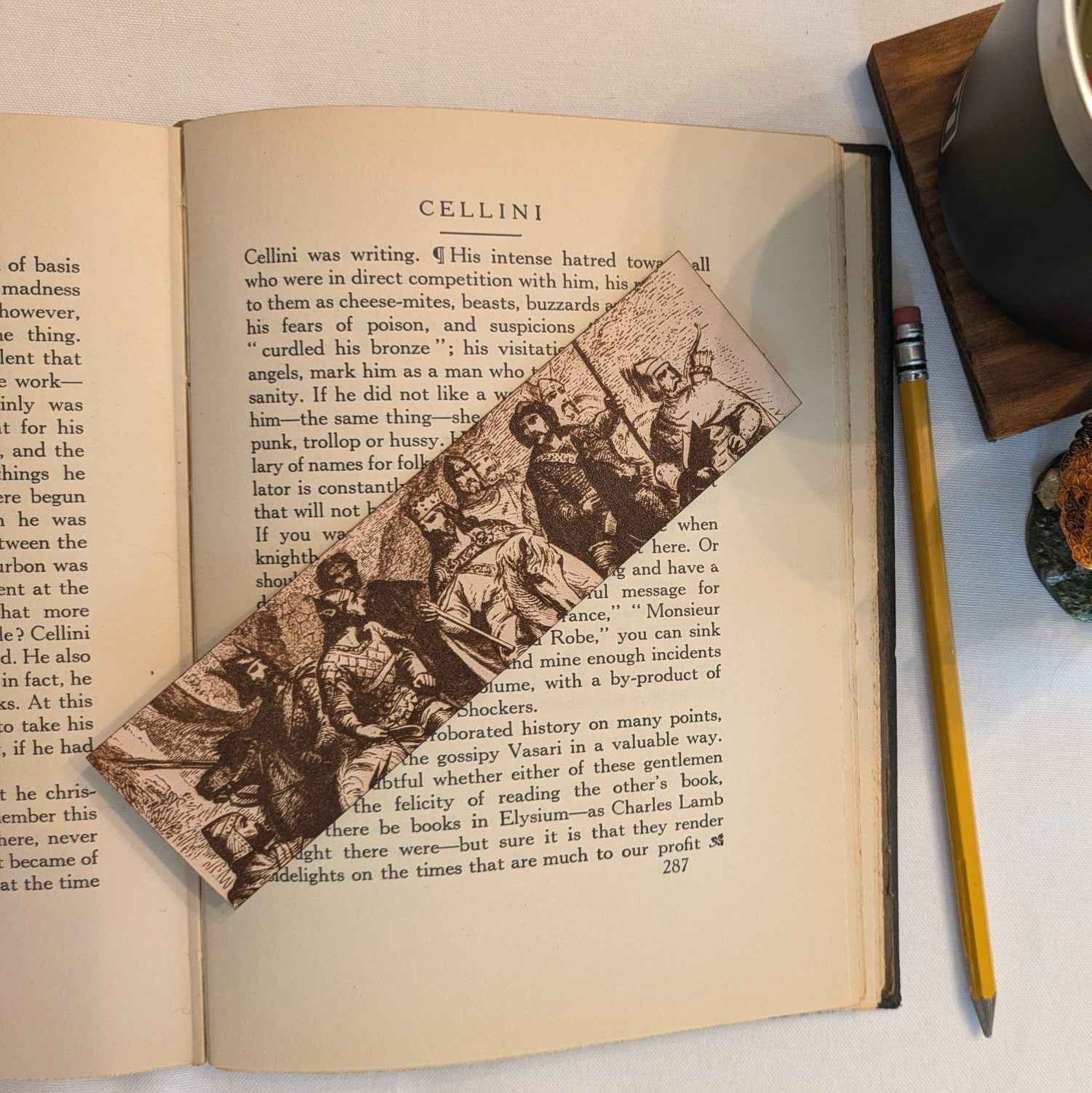 A leather bookmark engraved with the antique art of King Arthur and his knights. King with Knights Bookmark Bookmarks Raven King Crafts
