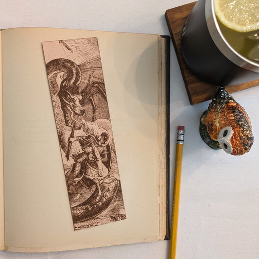 Bookmark with the historical art of a knight fighting a dragon. Knight Fighting a Dragon - Leather Historical Bookmark Bookmarks Raven King Crafts