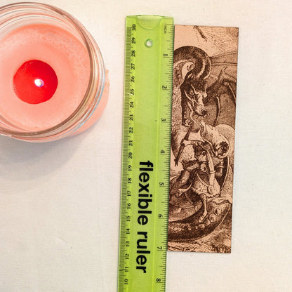 The dragon and knight fighting dragons next to a ruler to show scale. Knight Fighting a Dragon - Leather Historical Bookmark Bookmarks Raven King Crafts