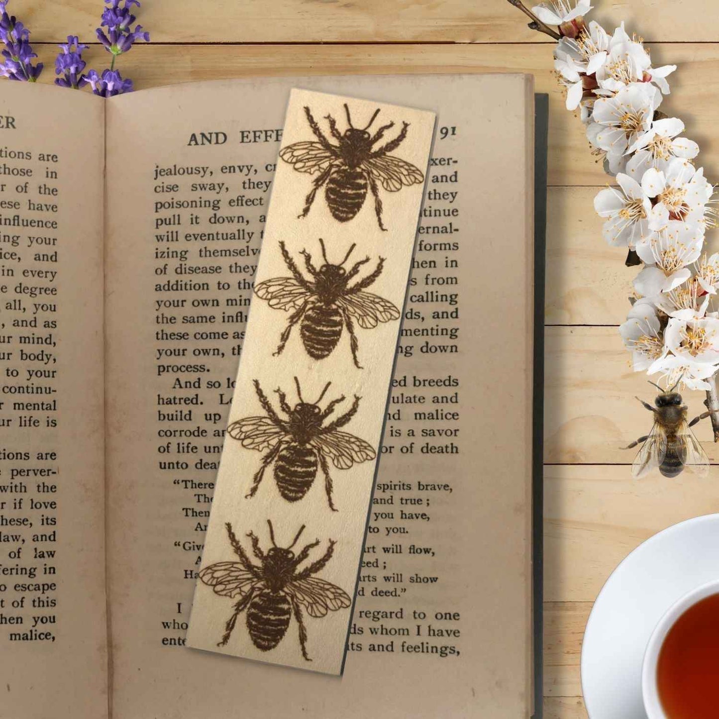 A leather bookmark with the antique art of bees engraved on it. Leather Bee Bookmark Bookmarks Raven King Crafts