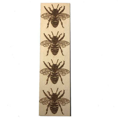 A leather bookmark with the antique art of bees engraved on it. Leather Bee Bookmark Bookmarks Raven King Crafts