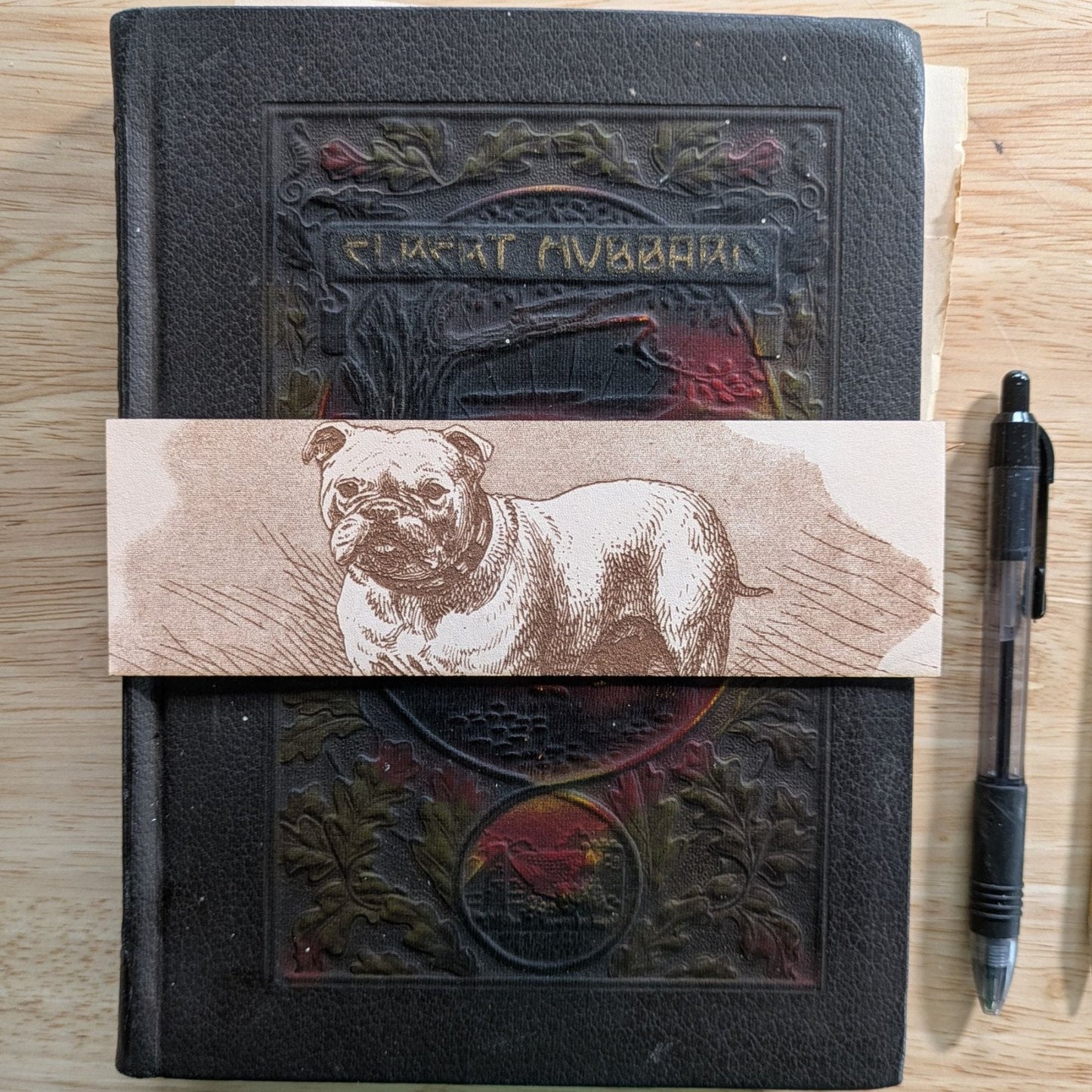 A rectangular leather bookmark with the historical art of a bulldog engraved on it. Leather Bulldog Dog Bookmark Bookmarks Raven King Crafts Leather Bulldog Dog Bookmark Bookmarks Raven King Crafts