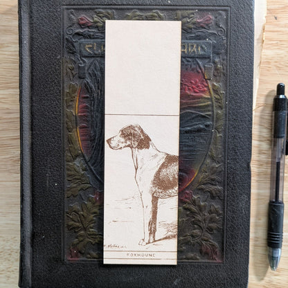 A rectangular leather bookmark with the historical art of a foxhound dog engraved on it. Leather Foxhound Bookmark Bookmarks Raven King Crafts Leather Foxhound Bookmark Bookmarks Raven King Crafts